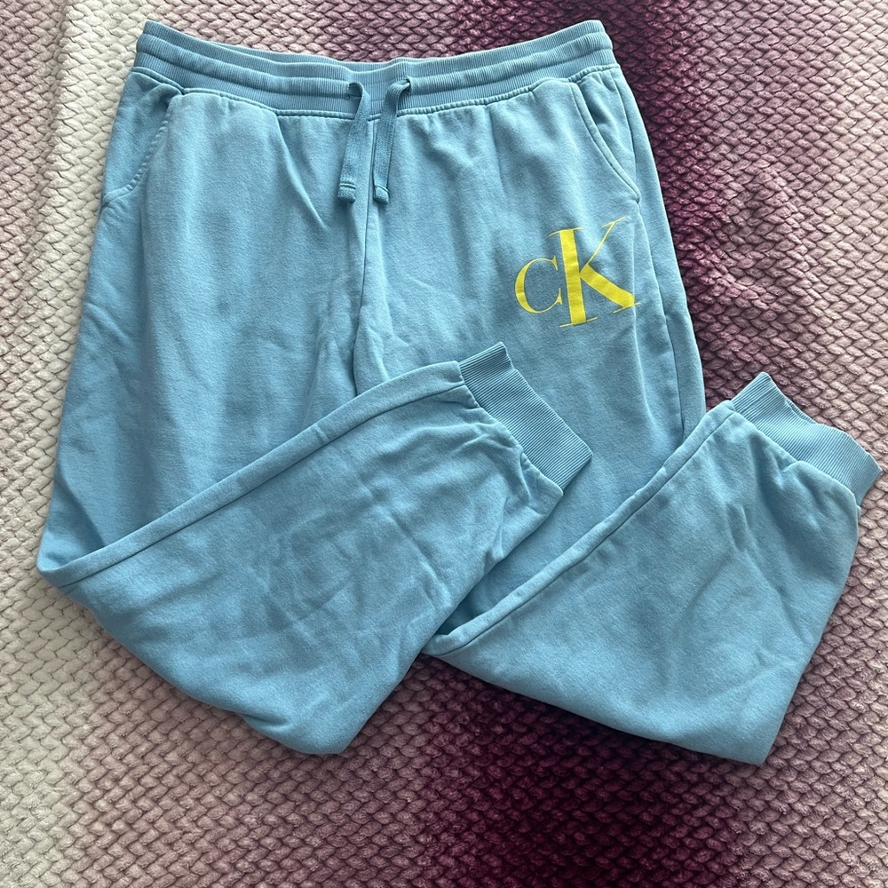 Calvin Klein Light Blue Sweatpants with Yellow Logo